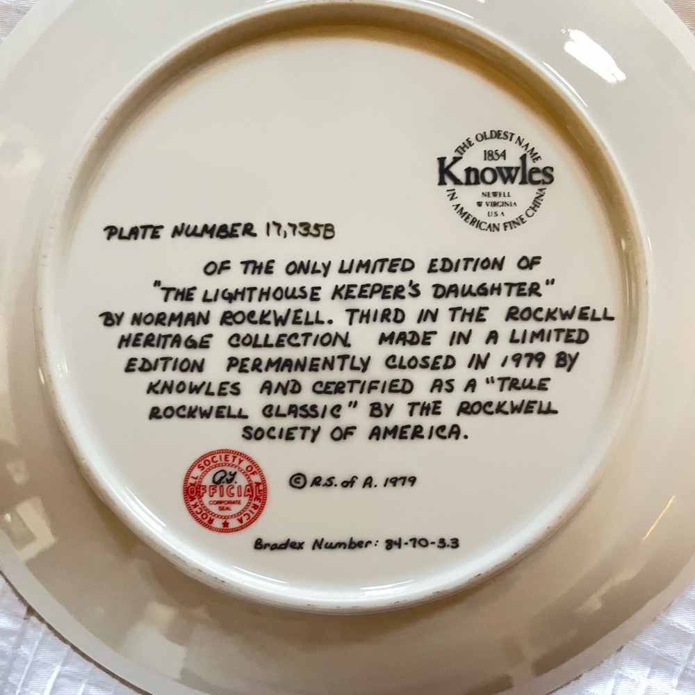 Two Norman Rockwell decorative plates.